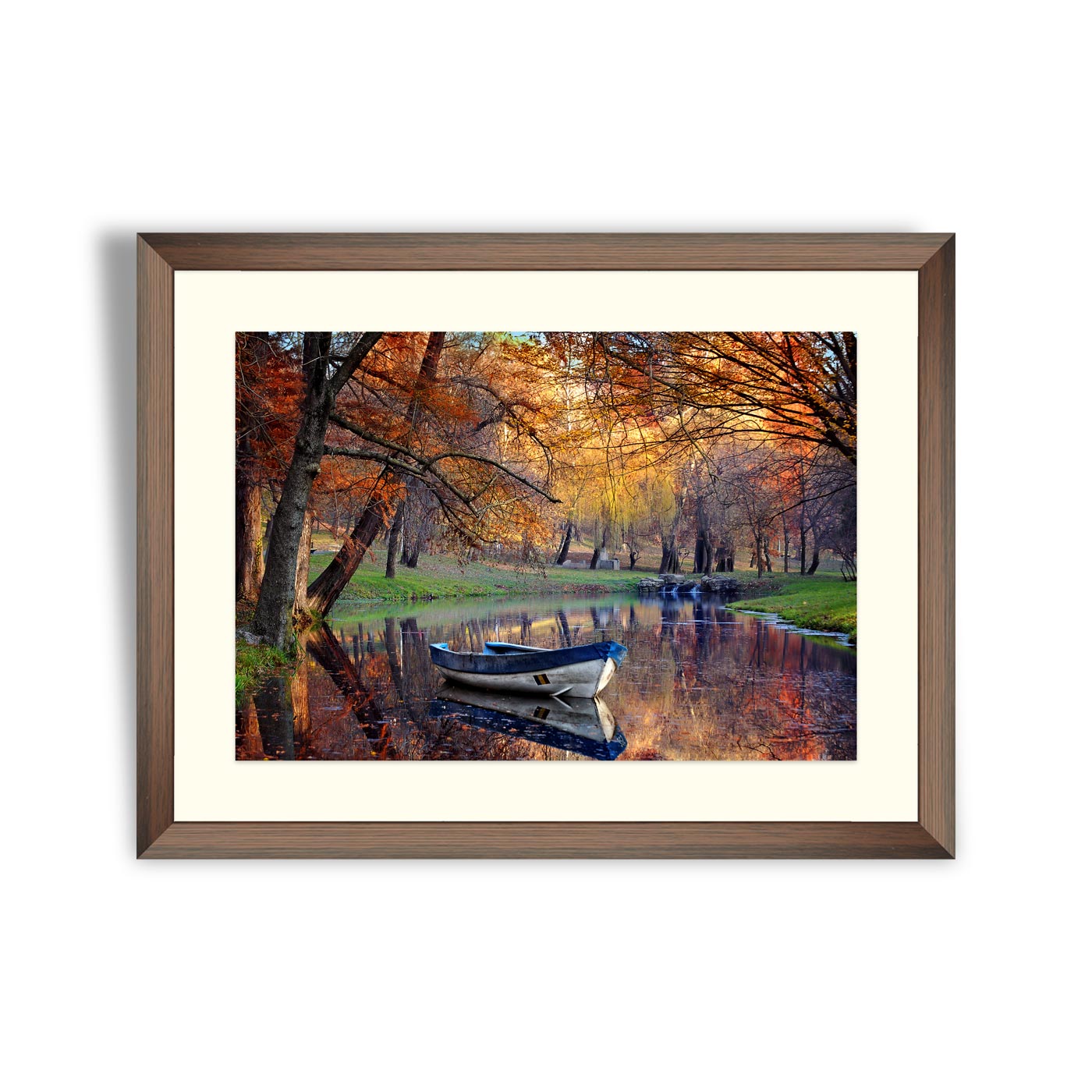 Boat on the lake in the autumnal forest