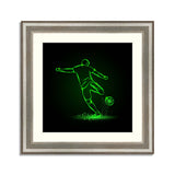 Soccer striker, back view. Football player hits the ball in the dark