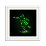 Soccer striker, back view. Football player hits the ball in the dark